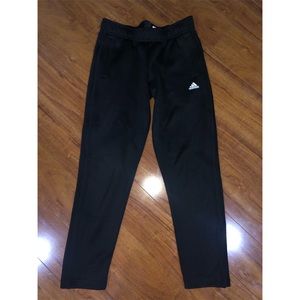 Balck adidas sweatpants with bottoms on the side